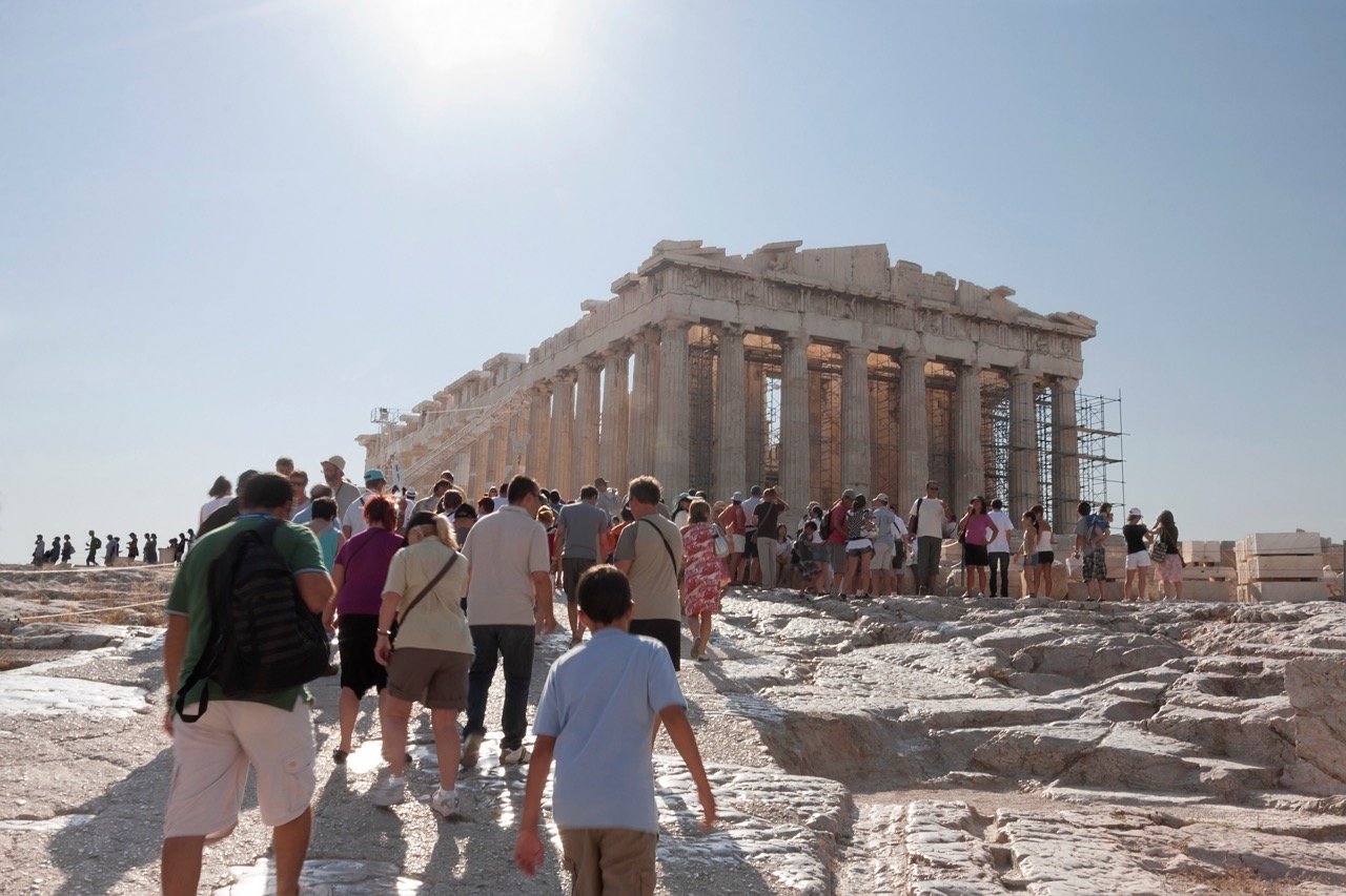 Tourist at Ancient Ruins Of The Acropolis