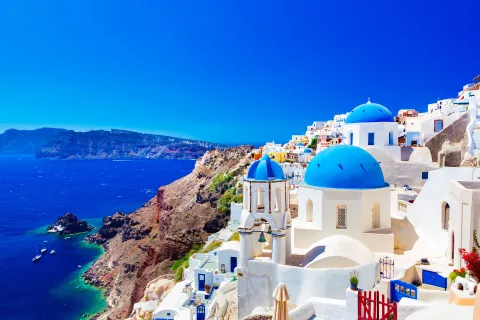 Oia town on Santorini island, Greece. Caldera on Aegean sea.