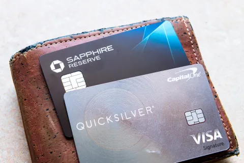 Chase Sapphire reserve, Quicksilver Capital One credit card on wallet for international travel macro closeup