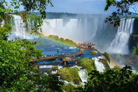 Tourists at Iguazu Falls, on the border of Brazil, Argentina, and Paraguay.