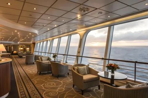 Cruise ship interior lounge with large windows