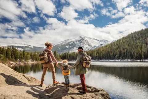 Family in Rocky mountains National park in USA