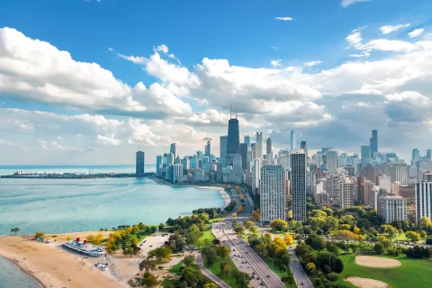 Chicago skyline aerial drone view from above, lake Michigan and city of Chicago downtown skyscrapers cityscape bird's view from Lincoln park
