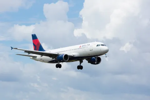 MIAMI, USA - September 11, 2016: A Delta Air Lines A320 aircraft landing at the Miami International Airport.