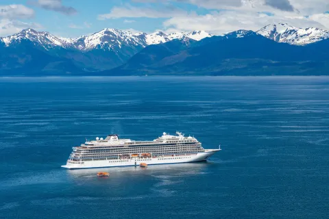 Hoonah, AK - 7 June 2022: Viking Orion cruise ship anchored at Icy Strait Point Alaska with passenger tenders