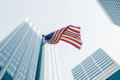 american flag in city