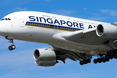Singapore Airlines Airbus A380 on final approach to landing with a clear blue sky