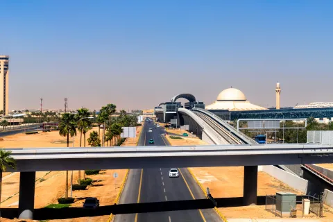 Modern architecture of the Riyadh metro line station and highway infrastructure at King Khalid International Airport in Saudi Arabia