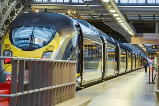 Eurostar train on platform at St Pancras International railway station-