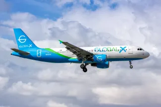 Global X Airbus A320 airplane at Miami Airport in the United States