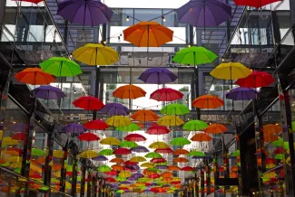 Colorful umbrellas on downtown street in Washington DC, USA