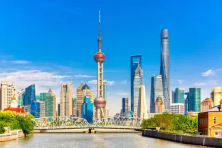 Shanghai pudong skyline with historical Waibaidu bridge, China
