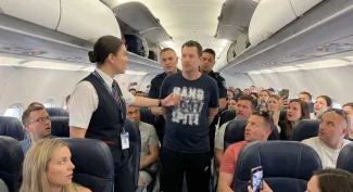 American Airlines passenger being removed