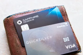 Chase Sapphire reserve, Quicksilver Capital One credit card on wallet for international travel macro closeup