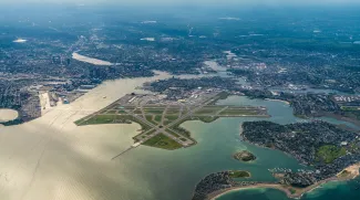 aerial view of the area around Boston and "Edward Lawrence Logan International Airport" with runway environment
