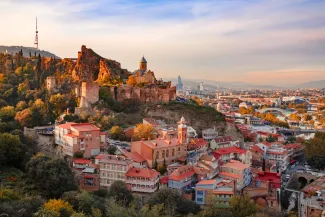 Beautiful sunset view of Old Tbilisi from the hill