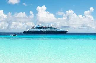 Luxury Cruise Ship Jacques Cartier of Ponant Cruises anchored at Assumption Island