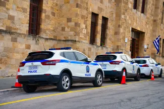 Rhodes, Greece - 21.10.2023: Police cars near Rhodes Police Headquarters.