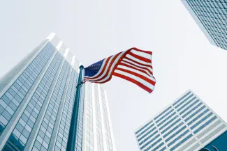 american flag in city