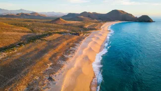 aerial of Todos Santos Baja California Sur sand dunes beach sunset ocean sea