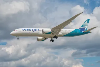 Westjet Boeing 787 Dreamliner on approach to Heathrow Airport