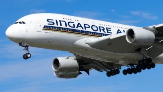 Singapore Airlines Airbus A380 on final approach to landing with a clear blue sky