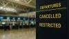 flight departure board at international airport showing cancelled and restricted flights due to airspace closure and global travel disruption