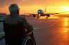Disabled Traveler looks at plane on tarmac