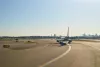 airplane at LaGuardia Airport. LaGuardia Airport is an international airport located in the northern part of Queens, New York City.