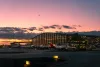 Sunset over Terminal 5 at London Heathrow airport, UK