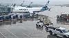 Westjet planes parked at Toronto Pearson International Airport terminal.