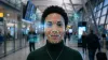 Advanced facial recognition technology digitally authenticates a woman's identity in a high-tech airport terminal,