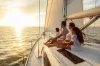Family travel adventures on luxury yacht at sunset