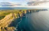 Aerial birds eye drone view from the world famous cliffs of moher in county clare ireland. Scenic Irish rural countryside nature along the wild atlantic