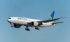 N77006 Boeing 777 United Airlines Landing in International Narita Airport, Japan.
