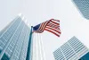american flag in city