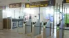 Passport-control gates and EU/EEA citizen signage in an airport terminal