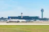 O'Hare Airport, Chicago, Illinois, USA - September 2, 2023 - A United Airlines Airbus taxis in front of the Air Traffic Control tower and Airport Hilton hotel at ORD in Chicago